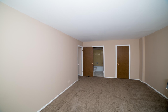 unfurnished bedroom featuring carpet floors