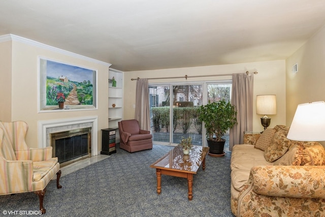 living room with built in shelves and carpet floors