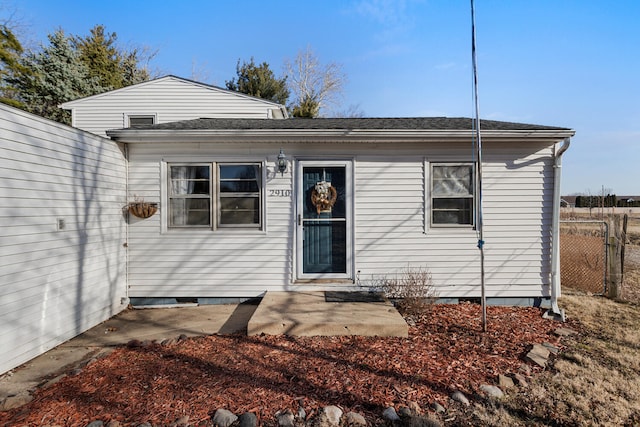 back of house featuring a patio area, crawl space, and fence