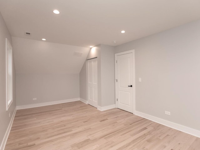 6310 Hilly Way, Cary, IL 60013 - spare room featuring light wood-style floors, recessed lighting, and vaulted ceiling