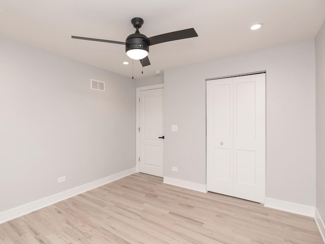 6310 Hilly Way, Cary, IL 60013 - unfurnished bedroom with light wood-style flooring, recessed lighting, a closet, and a ceiling fan