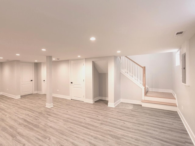 6310 Hilly Way, Cary, IL 60013 - finished basement with light wood finished floors, electric panel, stairs, and recessed lighting