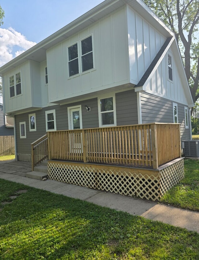 6310 Hilly Way, Cary, IL 60013 - back of house featuring board and batten siding and a wooden deck