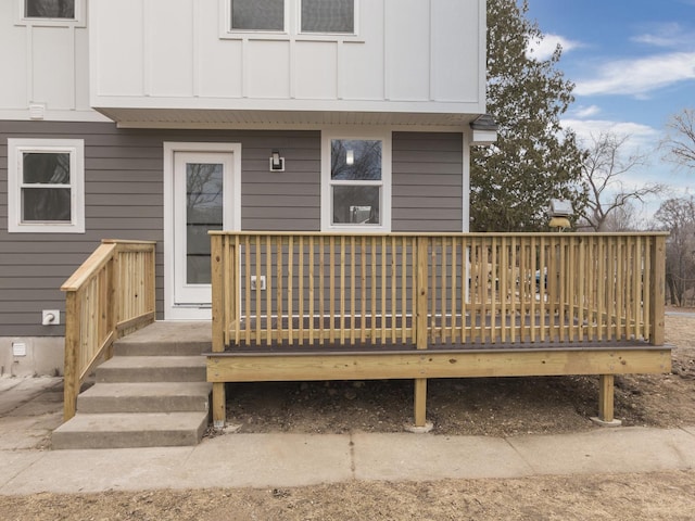 6310 Hilly Way, Cary, IL 60013 - entrance to property with board and batten siding and a deck