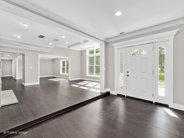 entryway with crown molding, dark hardwood / wood-style floors, and beam ceiling