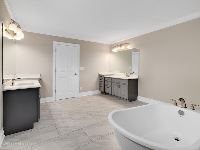 bathroom featuring ornamental molding, a tub to relax in, and vanity