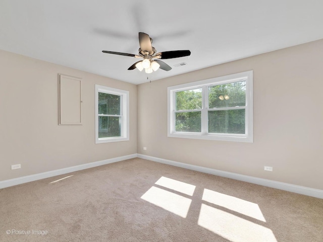 carpeted empty room with ceiling fan