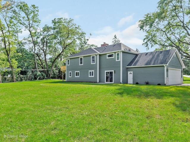 back of house featuring a yard