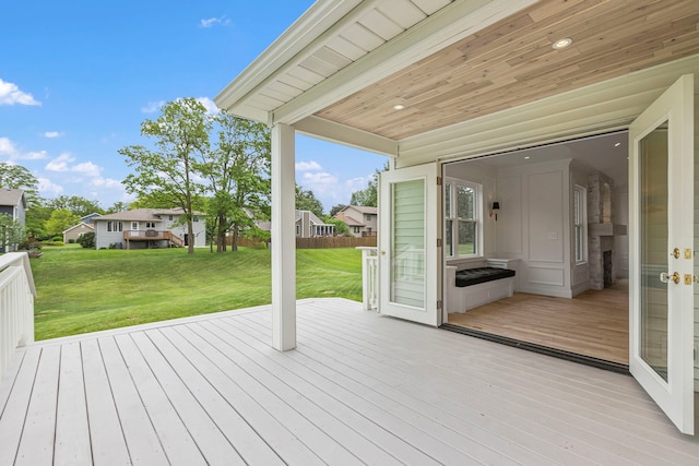 deck featuring a yard