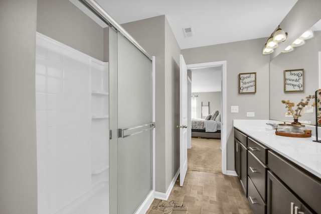 bathroom featuring vanity and walk in shower