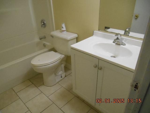 full bathroom featuring tile patterned flooring, vanity, bathing tub / shower combination, and toilet