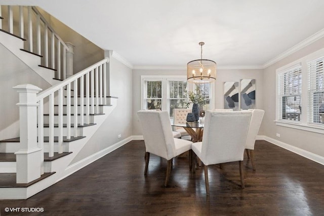 dining area with dark wood-type flooring, a healthy amount of sunlight, and crown molding