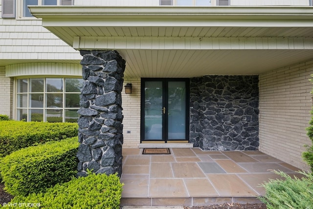 1247 Highpoint Ln, Northbrook, IL 60062 - property entrance with stone siding and brick siding