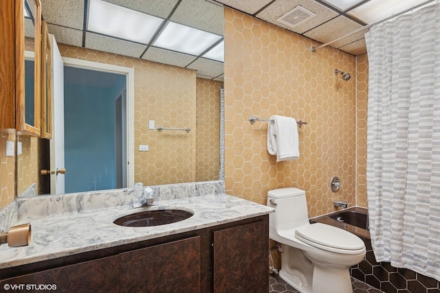 1247 Highpoint Ln, Northbrook, IL 60062 - full bathroom with shower / tub combo with curtain, vanity, a paneled ceiling, toilet, and tile patterned floors