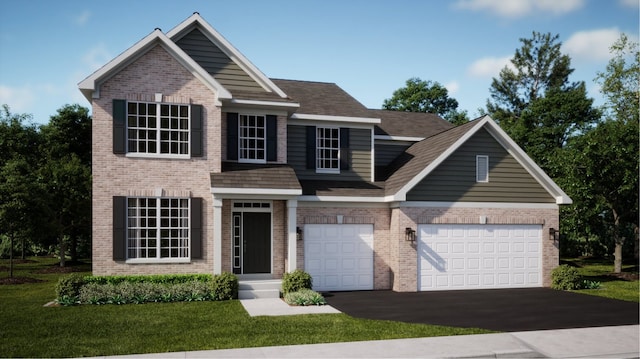 view of front of property with a garage and a front lawn