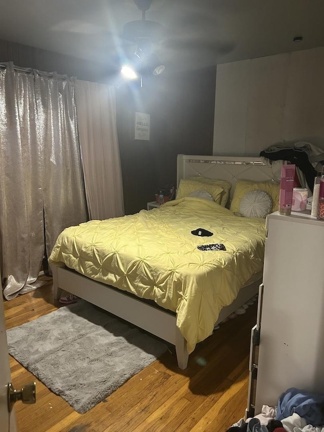 bedroom featuring wood-type flooring