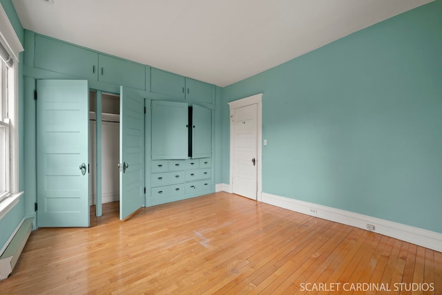 unfurnished bedroom featuring light hardwood / wood-style floors