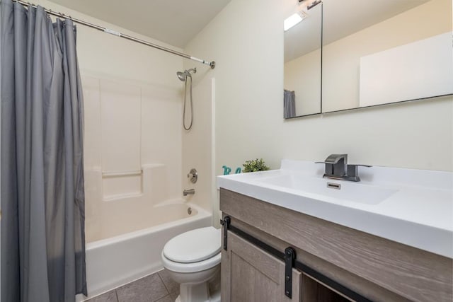 full bathroom featuring tile patterned flooring, vanity, shower / bath combo, and toilet