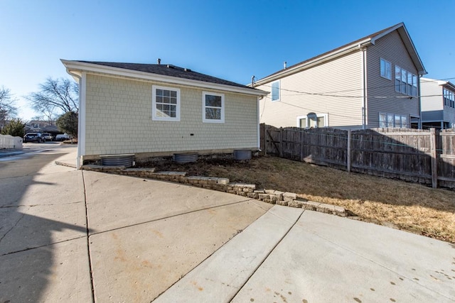 rear view of property featuring a patio