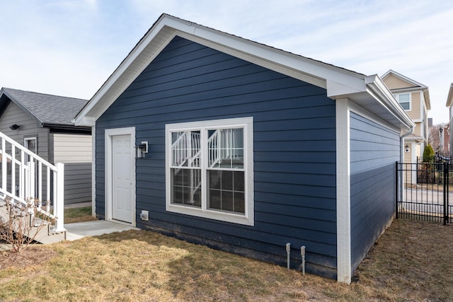 rear view of house with a yard