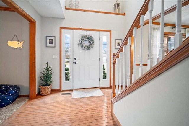 foyer entrance featuring light hardwood / wood-style flooring