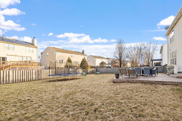 view of yard featuring a pergola, a trampoline, and a patio area