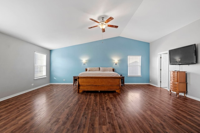 bedroom with dark wood-type flooring, ceiling fan, and lofted ceiling