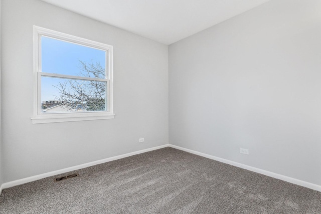 view of carpeted spare room