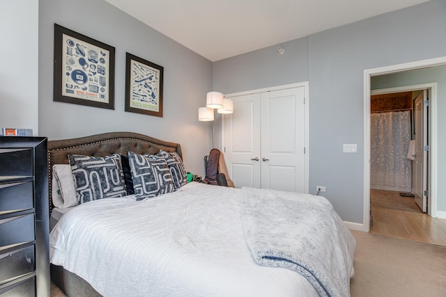 bedroom featuring carpet floors and a closet