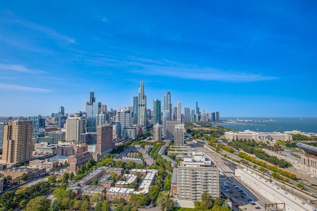 property's view of city featuring a water view