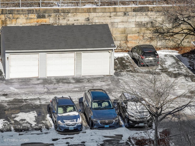 view of snow covered garage