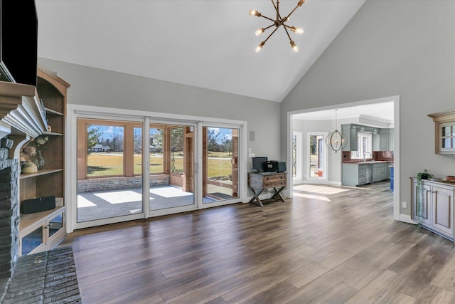 1801 Cobblefield Ct, Champaign, IL 61822 - living room featuring a chandelier, high vaulted ceiling, dark wood-type flooring, and baseboards