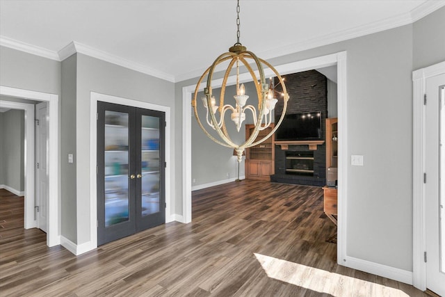 1801 Cobblefield Ct, Champaign, IL 61822 - unfurnished dining area with french doors, wood finished floors, crown molding, baseboards, and a chandelier