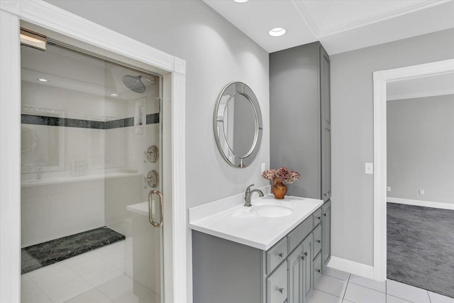 1801 Cobblefield Ct, Champaign, IL 61822 - bathroom with tile patterned flooring, a shower stall, vanity, baseboards, and recessed lighting