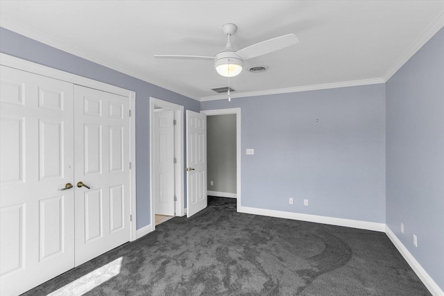 1801 Cobblefield Ct, Champaign, IL 61822 - unfurnished bedroom with dark colored carpet, baseboards, crown molding, a closet, and ceiling fan