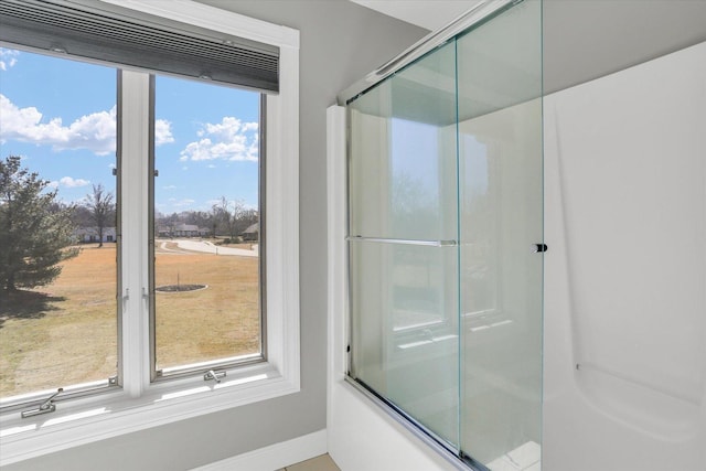1801 Cobblefield Ct, Champaign, IL 61822 - bathroom featuring shower / bath combination with glass door