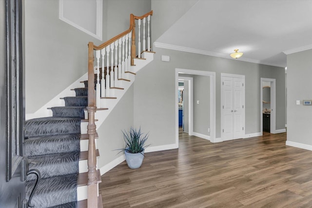 1801 Cobblefield Ct, Champaign, IL 61822 - stairs featuring crown molding, wood finished floors, and baseboards