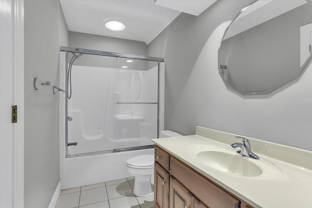 1801 Cobblefield Ct, Champaign, IL 61822 - full bathroom featuring toilet, bath / shower combo with glass door, vanity, tile patterned floors, and baseboards