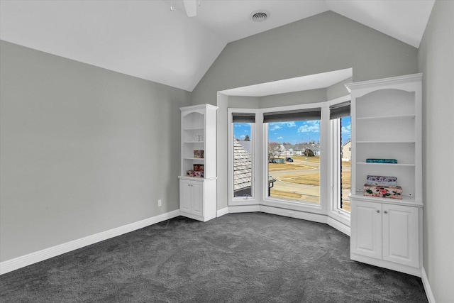 1801 Cobblefield Ct, Champaign, IL 61822 - empty room with lofted ceiling, dark colored carpet, and baseboards