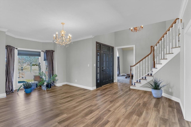 1801 Cobblefield Ct, Champaign, IL 61822 - entryway with a chandelier, stairs, wood finished floors, and crown molding