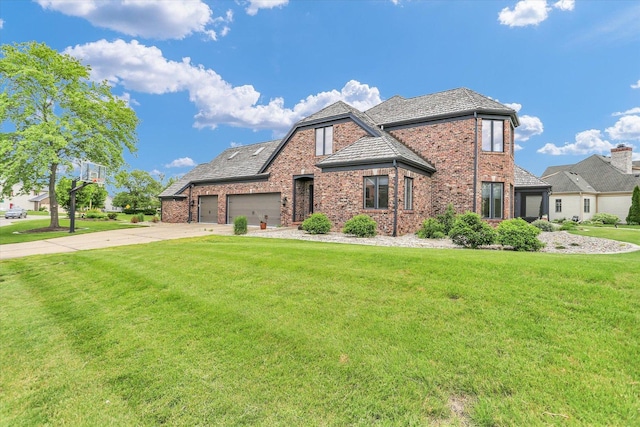 1801 Cobblefield Ct, Champaign, IL 61822 - view of front of property featuring brick siding, a front yard, driveway, and a garage