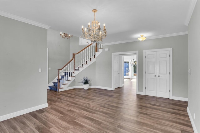 1801 Cobblefield Ct, Champaign, IL 61822 - foyer entrance featuring a chandelier, stairway, wood finished floors, baseboards, and ornamental molding