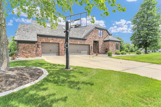 1801 Cobblefield Ct, Champaign, IL 61822 - view of front of house featuring brick siding, a front lawn, concrete driveway, and an attached garage