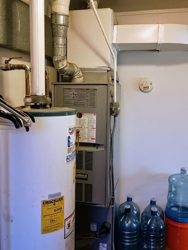 utility room with gas water heater