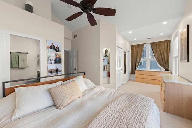 carpeted bedroom with high vaulted ceiling, ceiling fan, and a closet