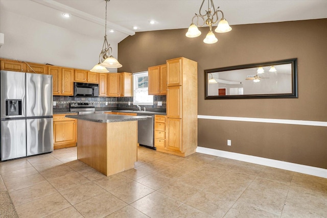 kitchen featuring stainless steel appliances, a kitchen island, baseboards, backsplash, and dark countertops