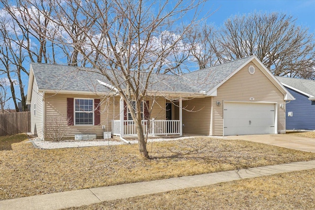 single story home featuring a shingled roof, covered porch, an attached garage, fence, and driveway