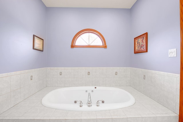 full bathroom featuring a jetted tub