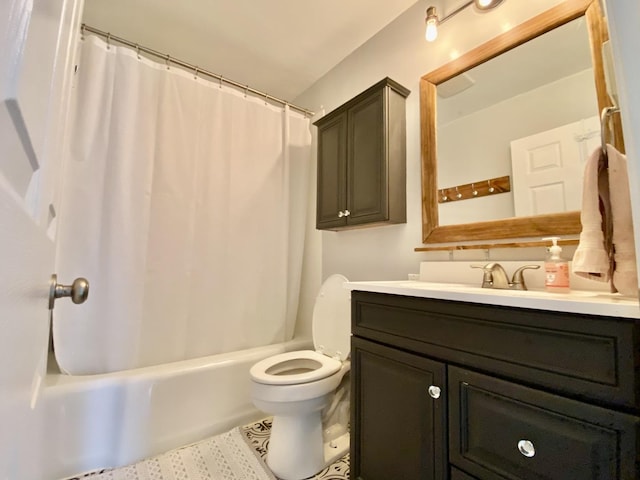 full bathroom featuring vanity, shower / bath combo, and toilet