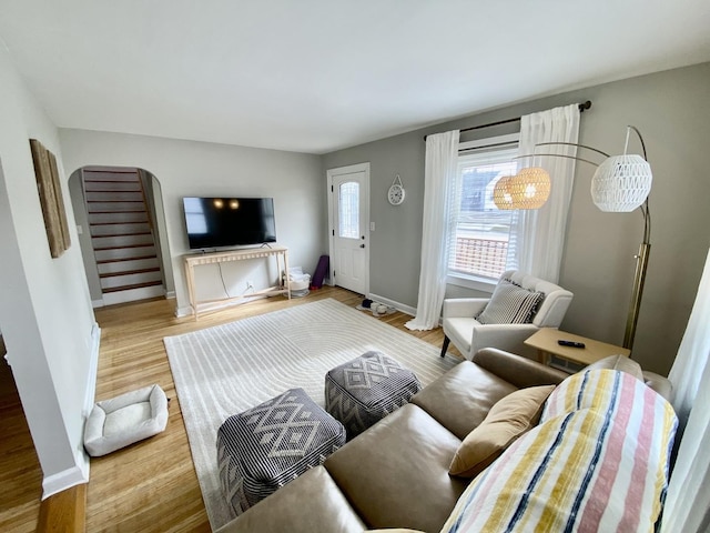 living room with light hardwood / wood-style floors